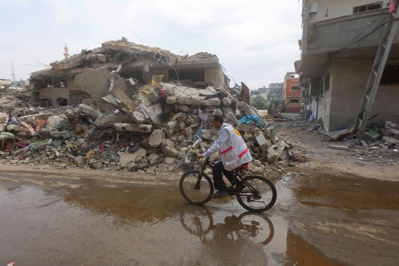 FILE PHOTO: Gaza doctor travels on his bicycle to help displaced patients amid fuel shortages