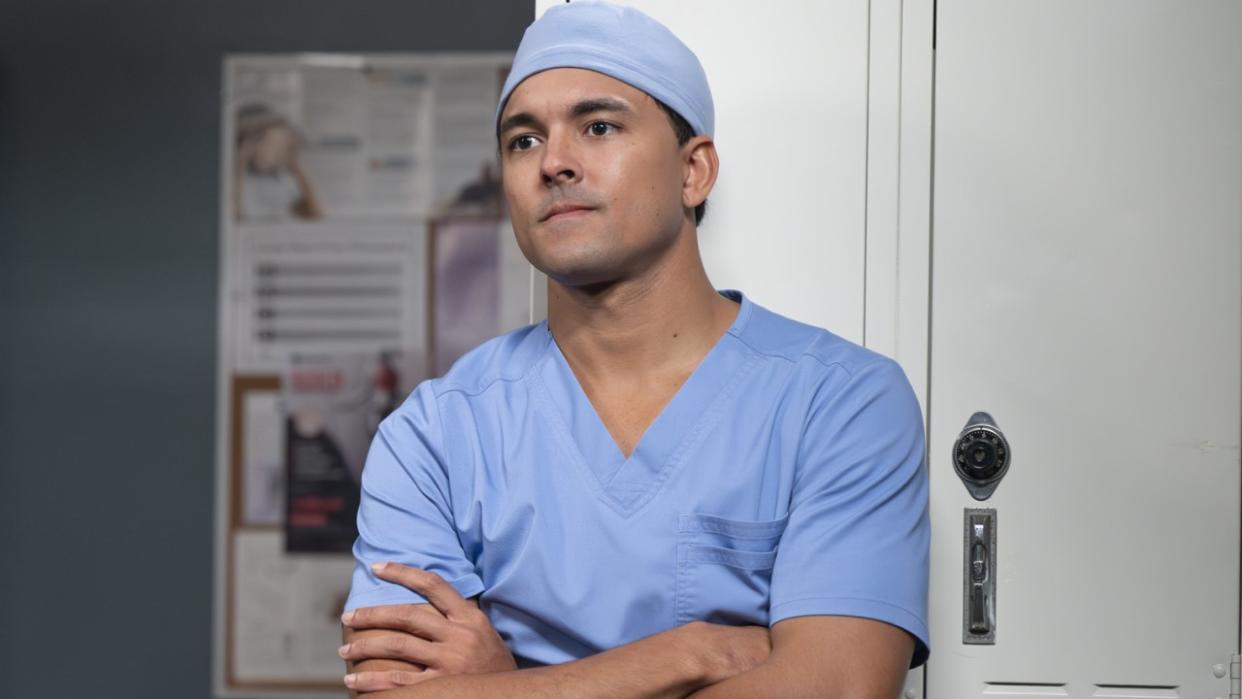  Lucas Adams (Niko Terho) crosses his arms and looks unhappy on the Grey's Anatomy Season 20 episode "I Carry Your Heart.". 