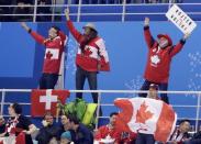 Ice Hockey – Pyeongchang 2018 Winter Olympics – Men Preliminary Round Match - Switzerland v Canada - Kwandong Hockey Centre, Gangneung, South Korea – February 15, 2018 - Canadian fans cheer during the game with Switzerland. REUTERS/David W Cerny