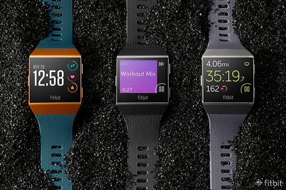 Three Fitbit Ionic smartwatches with different band colors