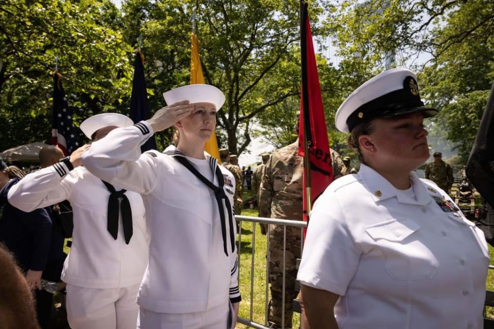 US sailors salute during the 156th Brooklyn's Memorial Day Parade in the Brooklyn borough of New York City on Monday.