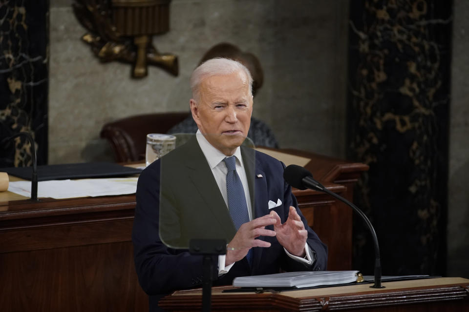 President Biden, seated in the House Chamber, holds forth during his State of the Union address.