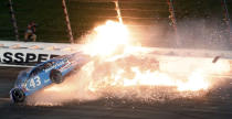 <p>Aric Almirola (43) crashes into Danica Patrick and Joey Logano during the NASCAR Monster Cup auto race at Kansas Speedway in Kansas City, Kan., May 13, 2017. (Photo: Colin E. Braley/AP) </p>