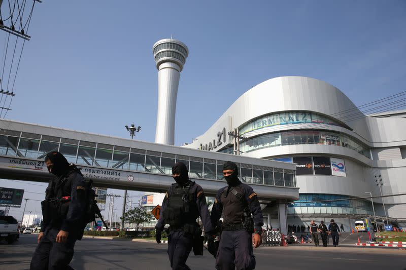 Thai security forces leave the Terminal 21 mall after completing their mission to stop a soldier on a rampage after a mass shooting, Nakhon Ratchasima