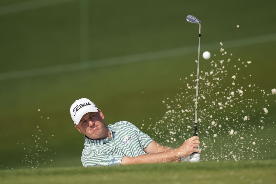 Tom Hoge hits from the bunker on the second hole during a practice round for the Masters golf tournament at Augusta National Golf Club on Wednesday, April 5, 2023, in Augusta, Ga. (AP Photo/David J. Phillip)