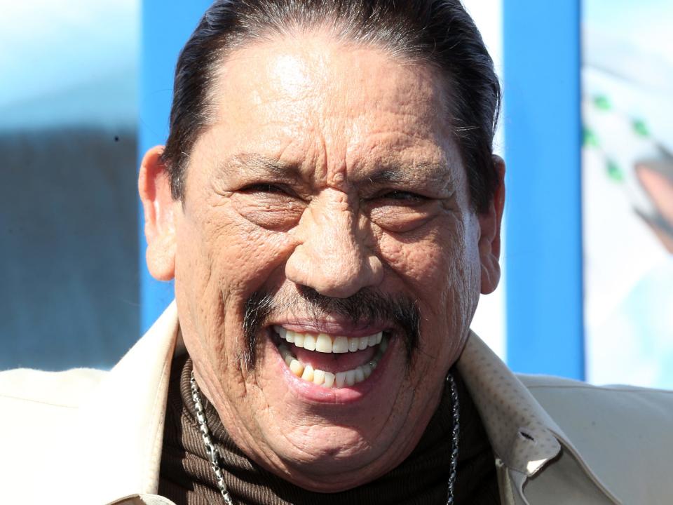 Danny Trejo smiles