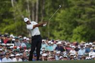 Tiger Woods of the U.S. hits off the 12th tee during second round play of the 2018 Masters golf tournament at the Augusta National Golf Club in Augusta, Georgia, U.S., April 6, 2018. REUTERS/Jonathan Ernst