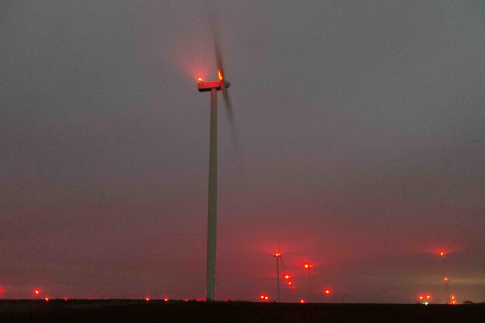 Kansas Gov. Laura Kelly signed a new law requiring wind farms to add technology, like aircraft detection, that turns off the blinking red lights.