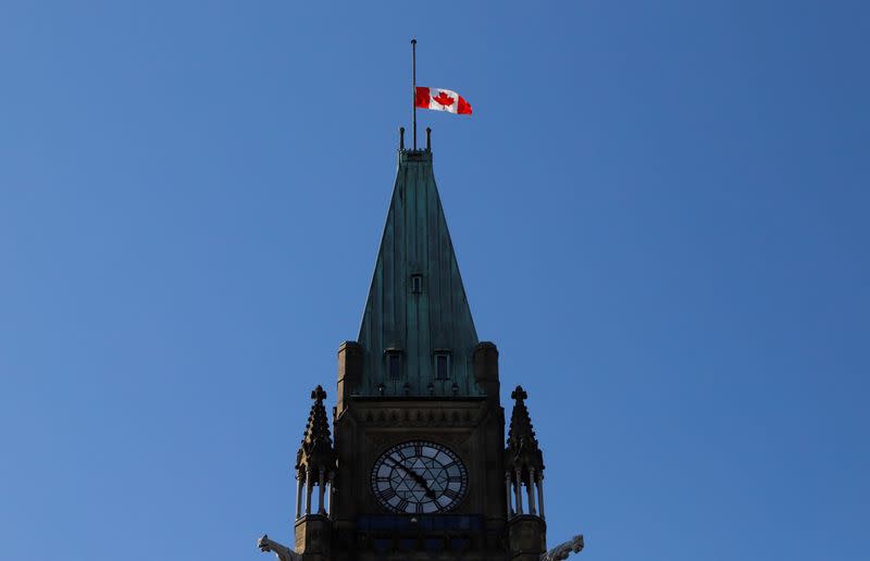 FILE PHOTO: The Canadian flag flies at half staff on the Peace Tower at the Parliament Buildings, after Queen Elizabeth's passing, in Ottawa