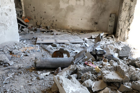 FILE PHOTO: The inside of a house damaged by shelling during the fighting between the eastern forces and internationally recognized government is pictured in Abu Salim in Tripoli, Libya April 15, 2019. REUTERS/Hani Amara