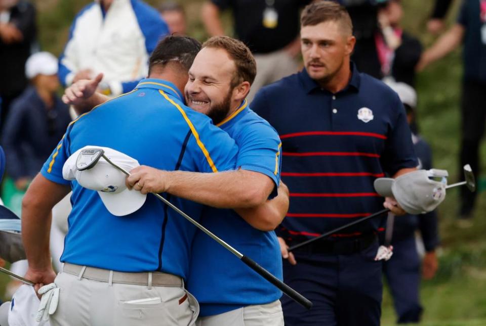 Tyrrell Hatton’s putt on the 18th earned Europe their only half-point in the afternoon fourball matches.