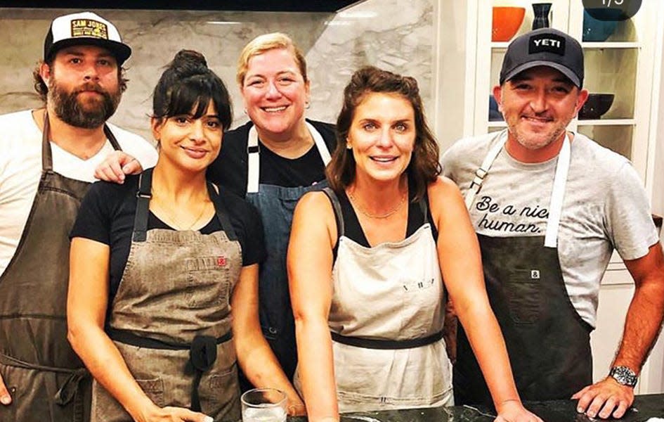 Cheetie Kumar (second from left), and Ashley Christensen (third from left) pose as a part of filming with Vivian Howard (second from right)