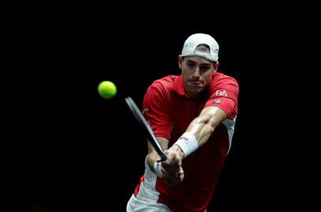 Tennis - Laver Cup - 1st Day - Prague, Czech Republic - September 22, 2017 - John Isner of team World in action against Dominic Thiem of team Europe. REUTERS/David W Cerny