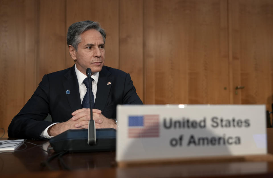 U.S. Secretary of State Antony Blinken attends a video message by United Nations Secretary General Antonio Guterres at the beginning of the 'Second Berlin Conference on Libya' at the foreign office in Berlin, Germany, Wednesday, June 23, 2021. (AP Photo/Michael Sohn, pool)