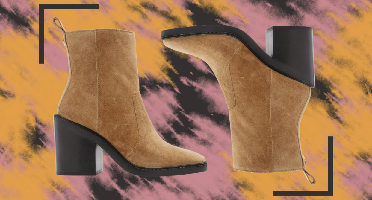 brown suede tory burch boots on tie dye background 