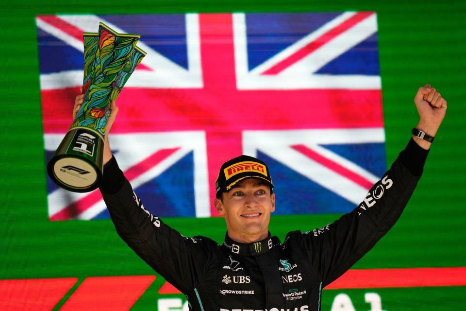 George Russell celebrates his victory at the Brazilian Grand Prix (AP)