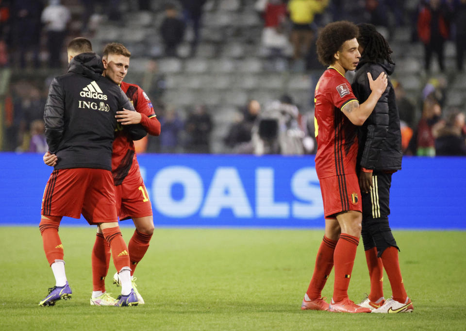 Belgium's players congratulate each other after winning their World Cup 2022 group E qualifying soccer match between Belgium and Estonia at the King Baudouin stadium in Brussels, Saturday, Nov. 13, 2021. (AP Photo/Olivier Matthys)