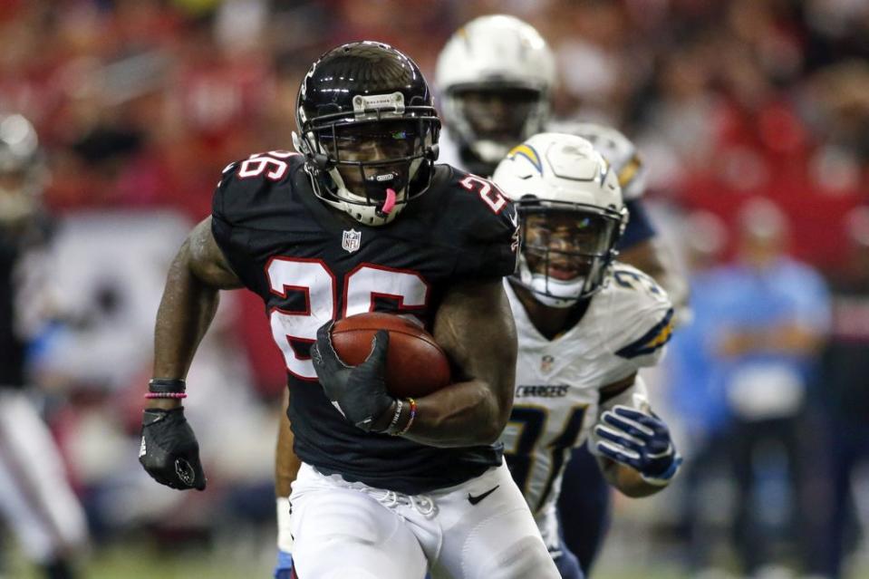 Oct 23, 2016; Atlanta, GA, USA; Atlanta Falcons running back Tevin Coleman (26) runs the ball for a touchdown against the San Diego Chargers in the second quarter at the Georgia Dome. Mandatory Credit: Brett Davis-USA TODAY Sports