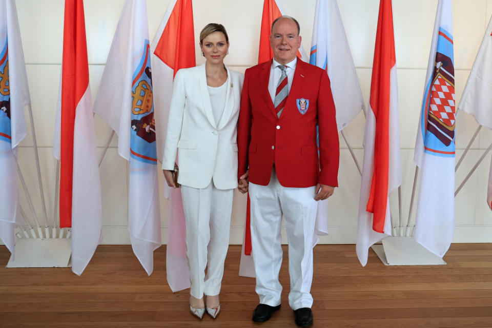 Prince Albert II of Monaco (R) and Princess Charlene of Monaco (L) pose during the presentation of Monaco's Olympic team for the Paris 2024 Games, in Monaco on June 27, 2024. (Photo by Valery HACHE / AFP) (Photo by VALERY HACHE/AFP via Getty Images)