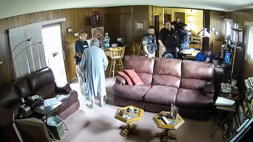 Joan Meyer, co-owner of the Marion County Record, swears at police officers in her home on Aug. 11, 2023. (Marion County Record)