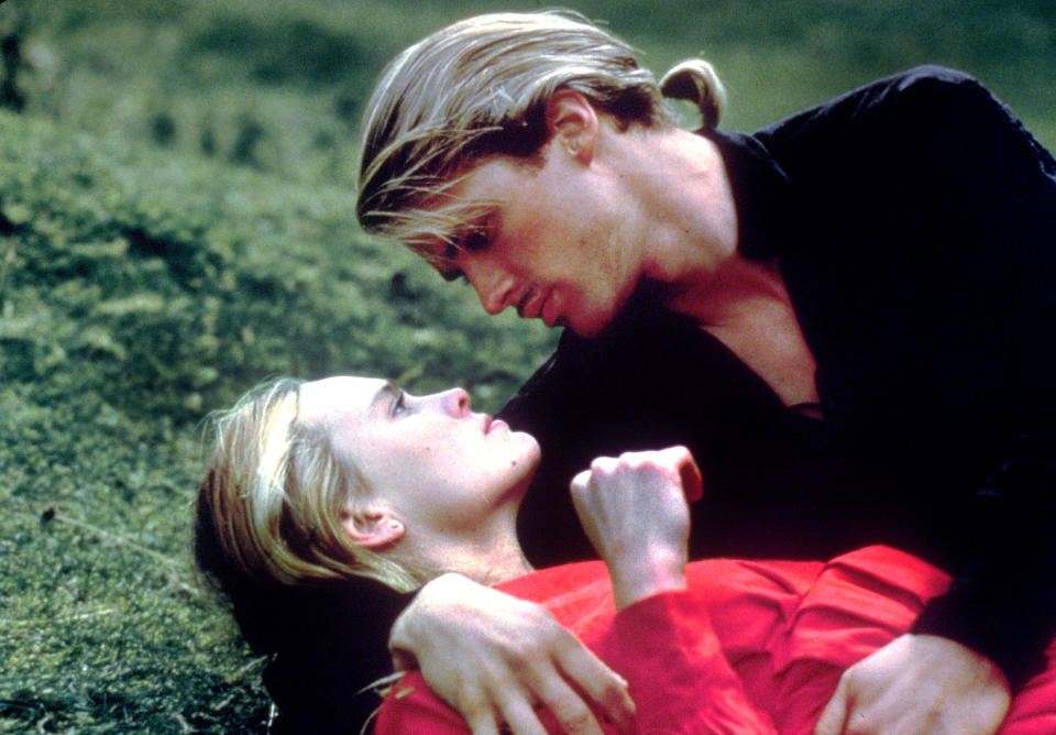 Buttercup and Westley in a romantic scene, laying on the ground