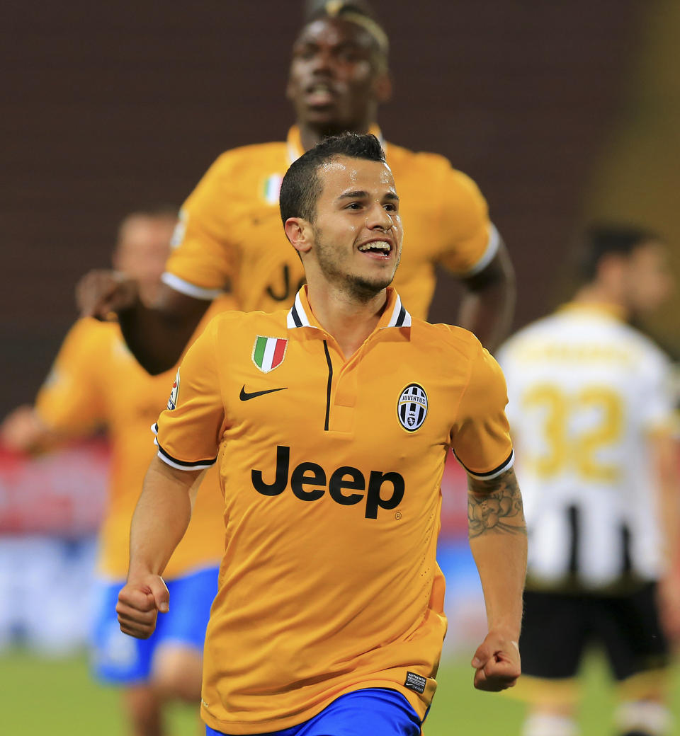 Juventus' Sebastian Giovinco celebrates after scoring during the Serie A soccer match between Udinese and Juventus at the Friuli Stadium in Udine, Italy, Monday, April 14 2014. (AP Photo/Paolo Giovannini)