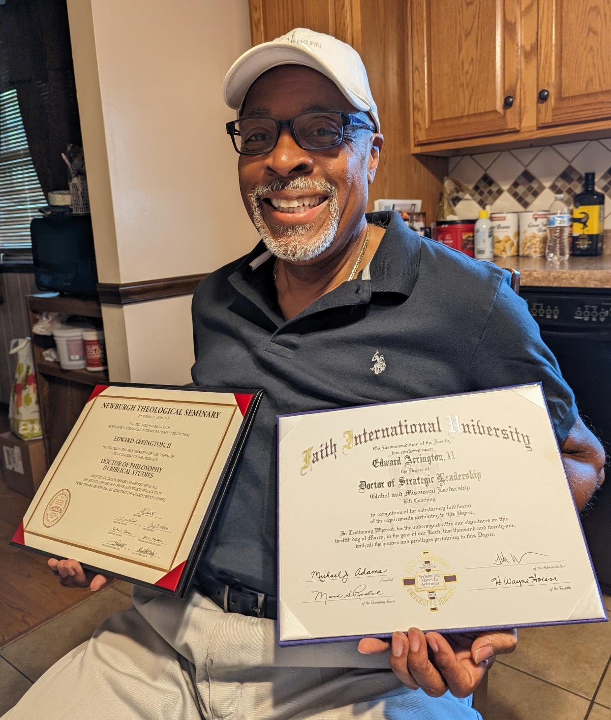 The Rev. Dr. Edward Arrington II, an associate pastor at Friends Baptist Church in Massillon, recently earned his second doctorate (left) at age 72. A retired educator, Arrington was McKinley High School's band director from 2001 to 2007.