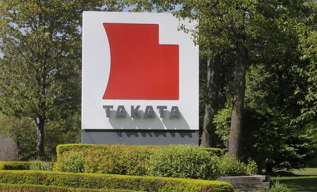 A sign with the Takata logo is seen along the driveway leading to the Takata Corporation building in Auburn Hills, Michigan May 20, 2015. REUTERS/Rebecca Cook