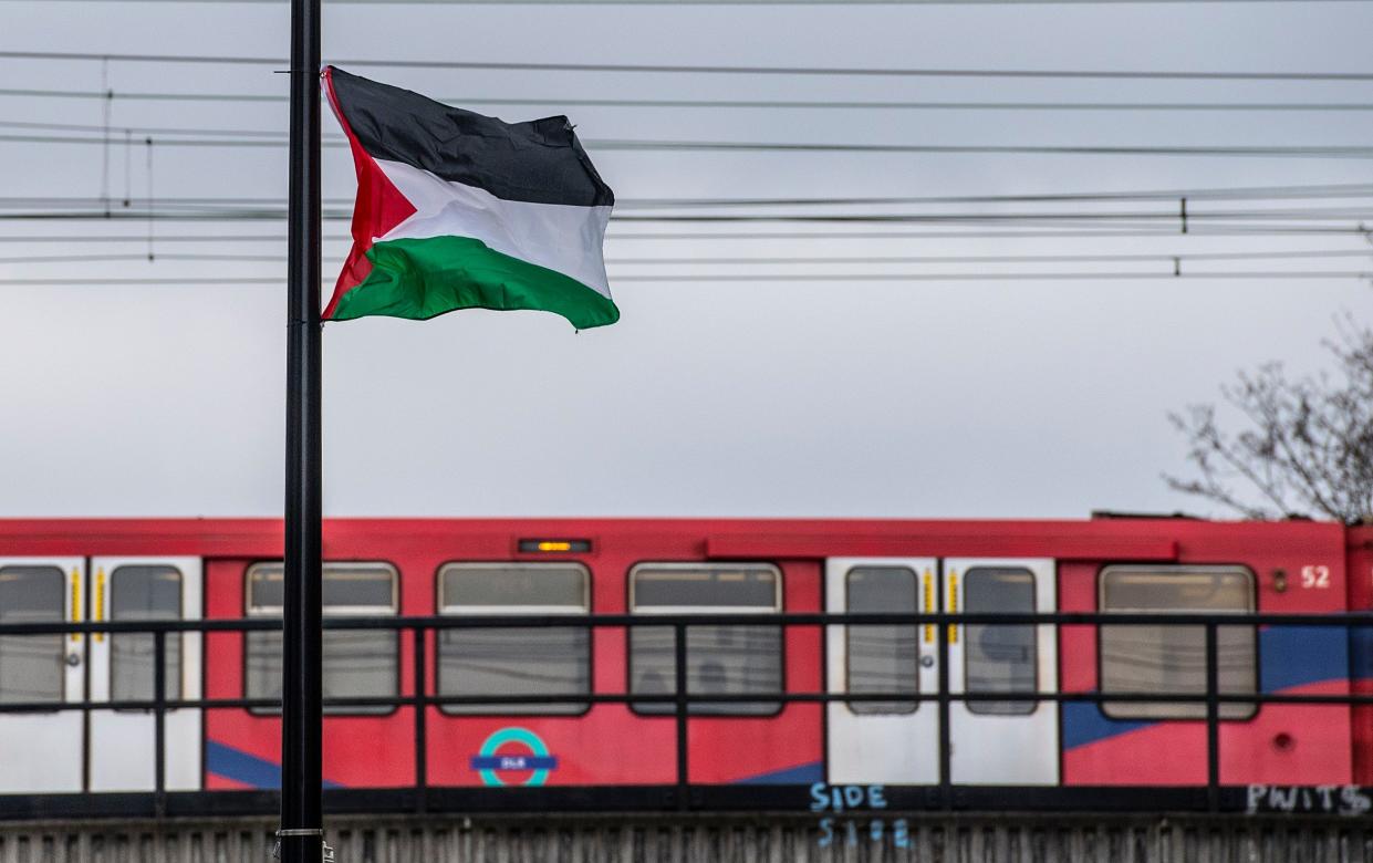Palestinian flags flying from lampposts in Tower Hamlets