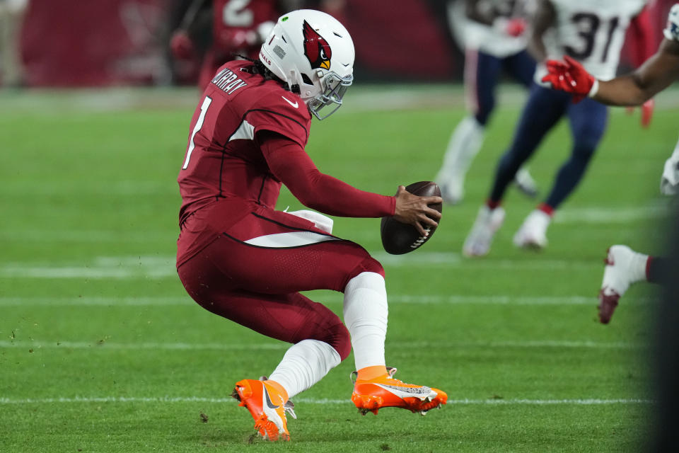 Arizona Cardinals quarterback Kyler Murray (1) falls to the ground due to an injury during the first half of an NFL football game against the New England Patriots, Monday, Dec. 12, 2022, in Glendale, Ariz. (AP Photo/Ross D. Franklin)
