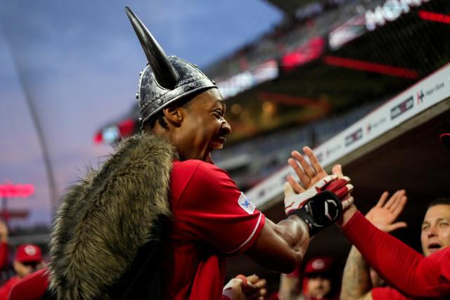 Reds' Jonathan India looks his best in a Viking helmet and at plate