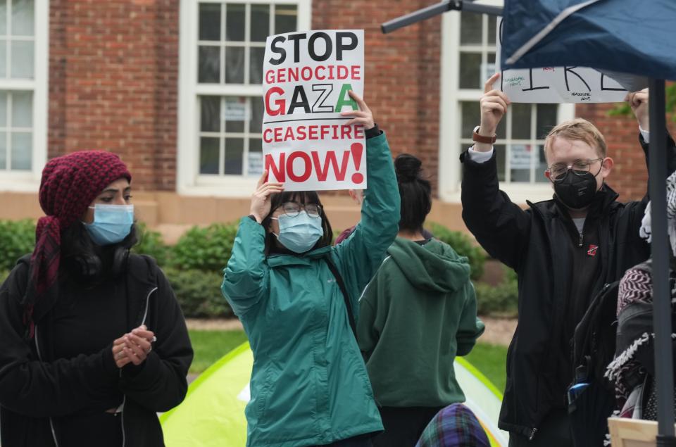 New Brunswick, NJ -- April 30, 2024 -- Rutgers students are led in chants and slogans in support of Palestinians as as they rallied outside Murray Hall, part of their protest in support of Palestinians affected by the war in Gaza.