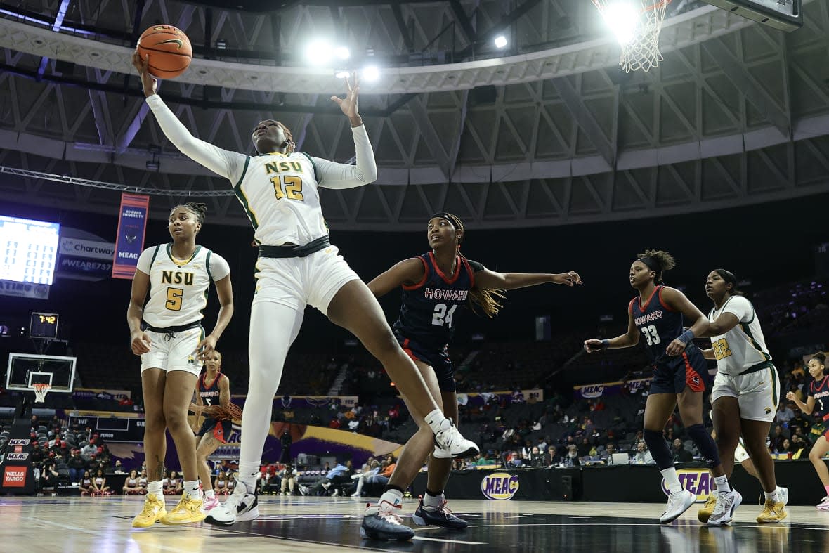 NORFOLK, VIRGINIA – MARCH 11: Makoye Diawara #12 of the Norfolk State Spartans gets a rebound past Brooklynn Fort-Davis #24 of the Howard Lady Bison during the second half during the 2023 MEAC Women’s Basketball Tournament Semifinals at Norfolk Scope Arena on March 11, 2023 in Norfolk, Virginia. (Photo by Tim Nwachukwu/Getty Images)