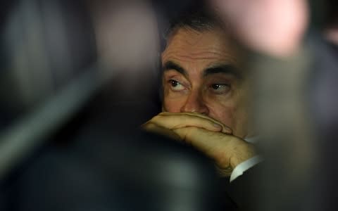 Carlos Ghosn - Credit: KAZUHIRO NOGI/AFP