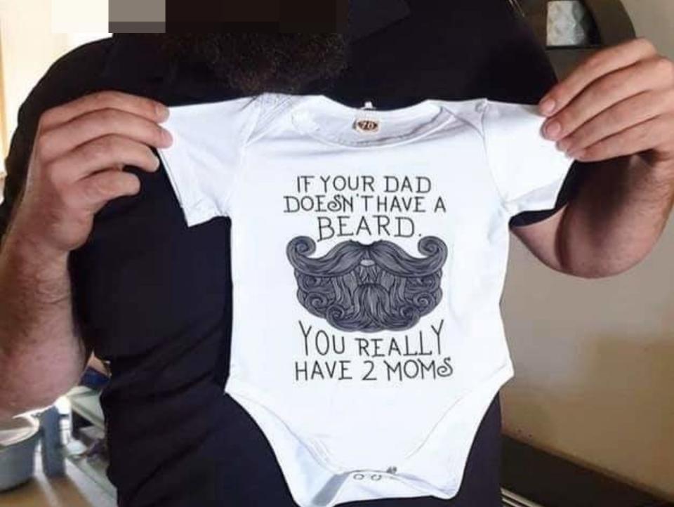 A onesie that says, "If your dad doesn't have a beard, you really have 2 moms"