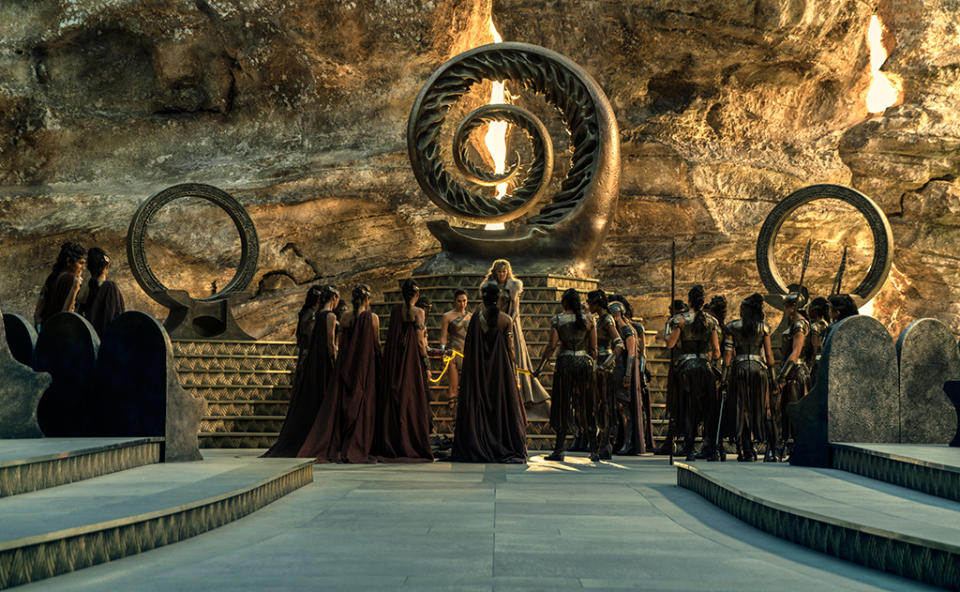 <p>Diana, Hippolyta, and their formidable female cohort gather together to decide the fate of the captive Trevor <span>— kill him or send him back to what they call “Man’s World.”</span> (Photo: Warner Bros.) </p>