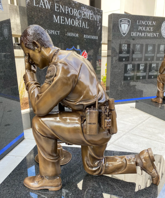 A bronze law enforcement statue done by Brodin Studios.