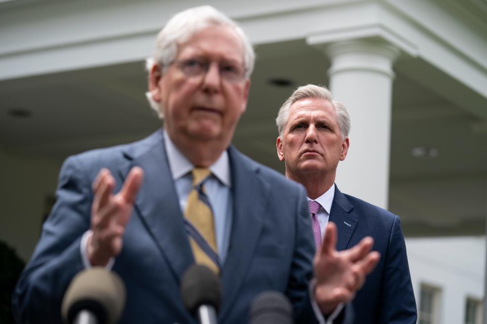 House Minority Leader Kevin McCarthy of Calif., listens as Senate Minority Leader Mitch McConnell of Ky., speaks to reporters outside the White House after a meeting with President Joe Biden, Wednesday, May 12, 2021, in Washington.