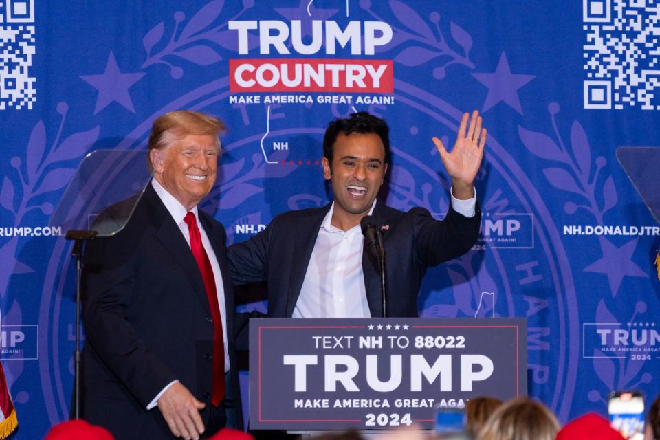 Former President Donald Trump and Vivek Ramaswamy address the crowd at a Trump campaign rally at Atkinson Country Club and Resort in Atkinson, N.H., on Jan. 16, 2024, a day after Ramaswamy ended his presidential bid and endorsed Trump.