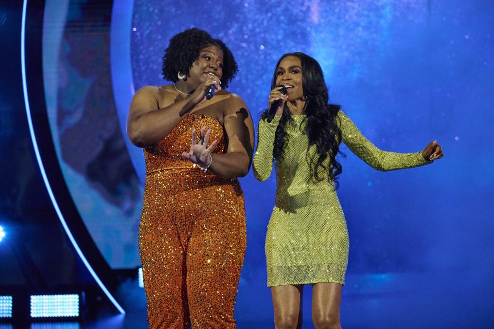 Cousins and Rockford natives Evandia Penix and Michelle Williams perform together on Fox's new television game show "We are Family," which aired Wednesday, Jan. 3, 2024.