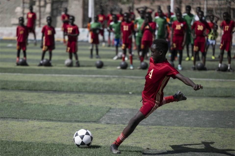 Children attend a soccer training session at "Mostaqbal" (Future) soccer academy for refugees, in Cairo, Egypt.