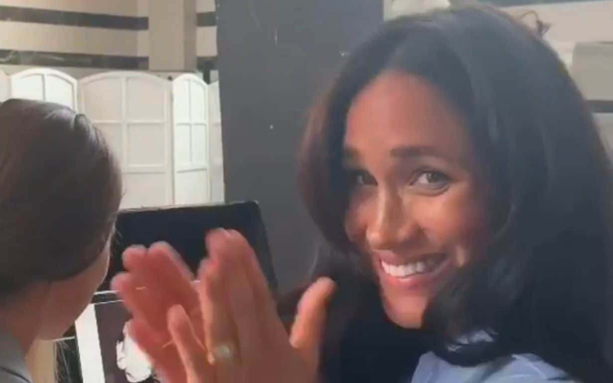 The Duchess of Sussex has made a a surprise appearance  at a fashion photoshoot for the charity Smart Works