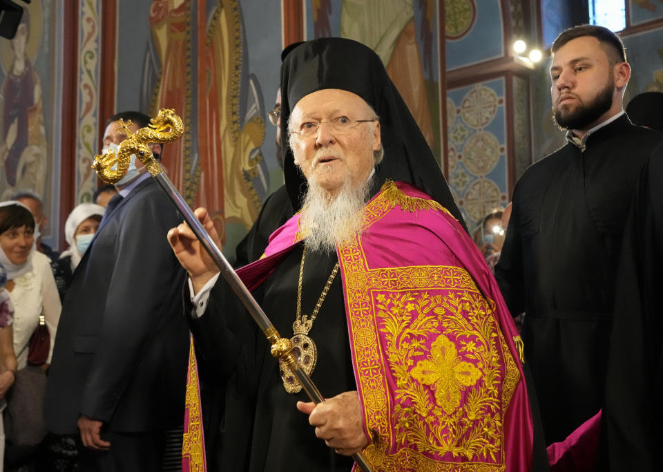 Ecumenical Patriarch Bartholomew I, blesses parishioners in the Mikhailovsky Zlatoverkhy Cathedral (St. Michael's Golden-Domed Cathedral) in Kyiv, Ukraine, Saturday, Aug. 21, 2021. Bartholomew I, arrived to Kyiv to mark the 30th anniversary of Ukraine's independence that is celebrated on Aug. 24. (AP Photo/Efrem Lukatsky)