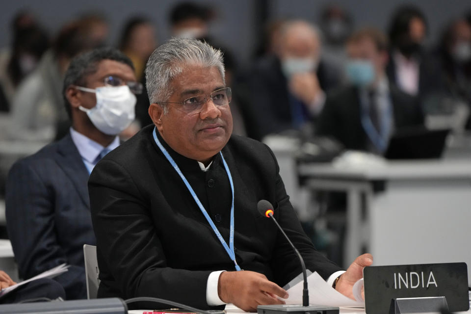 Indian minister for Environment and Climate Change Bhupender Yadav attends a stocktaking plenary session at the COP26 U.N. Climate Summit in Glasgow, Scotland, Saturday, Nov. 13, 2021. Going into overtime, negotiators at U.N. climate talks in Glasgow are still trying to find common ground on phasing out coal, when nations need to update their emission-cutting pledges and, especially, on money. (AP Photo/Alastair Grant)