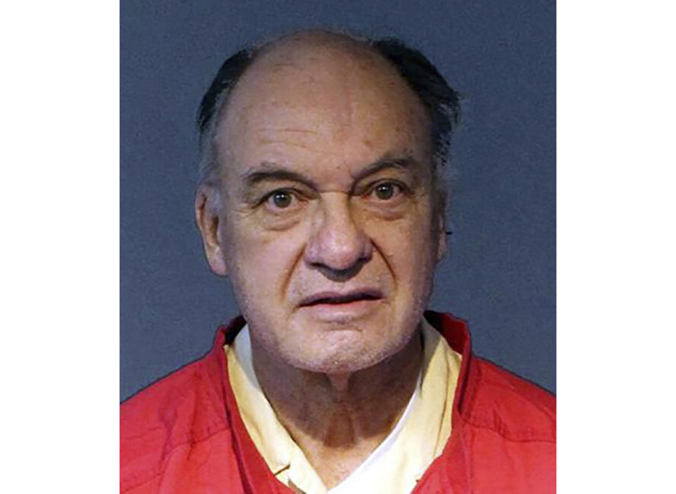 This undated photo provided by the Washoe County Sheriff's Office shows Charles Gary Sullivan, 73, of Flagstaff, Ariz., following his booking on Friday, Nov. 15, 2019, into the Washoe County Jail in Reno, Nev. The auto dealer from Arizona is expected to plead not guilty in Reno in the cold-case killing of a California woman more than 40 years ago. (Washoe County Sheriff's Office via AP)