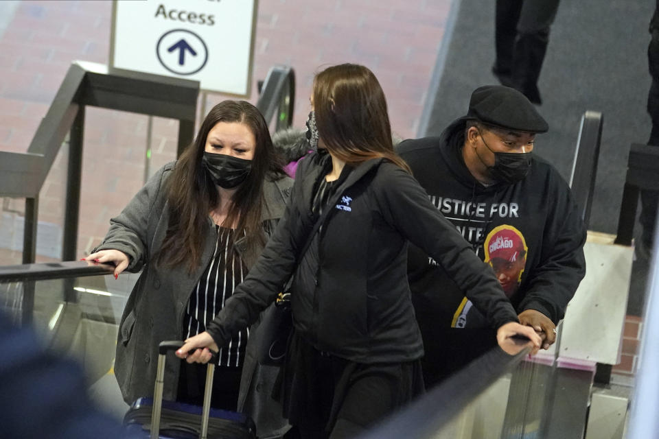 Katie Wright, the mother of Daunte Wright, left, and his father, Arbuey Wright, right, arrive Thursday, Dec. 2, 2021 at the Hennepin County Government Center in Minneapolis. Minneapolis police officer Kim Potter, who is white, is charged with manslaughter in the April 11 shooting of Wright, a 20-year-old Black motorist, following a traffic stop in Brooklyn Center. (AP Photo/Jim Mone)