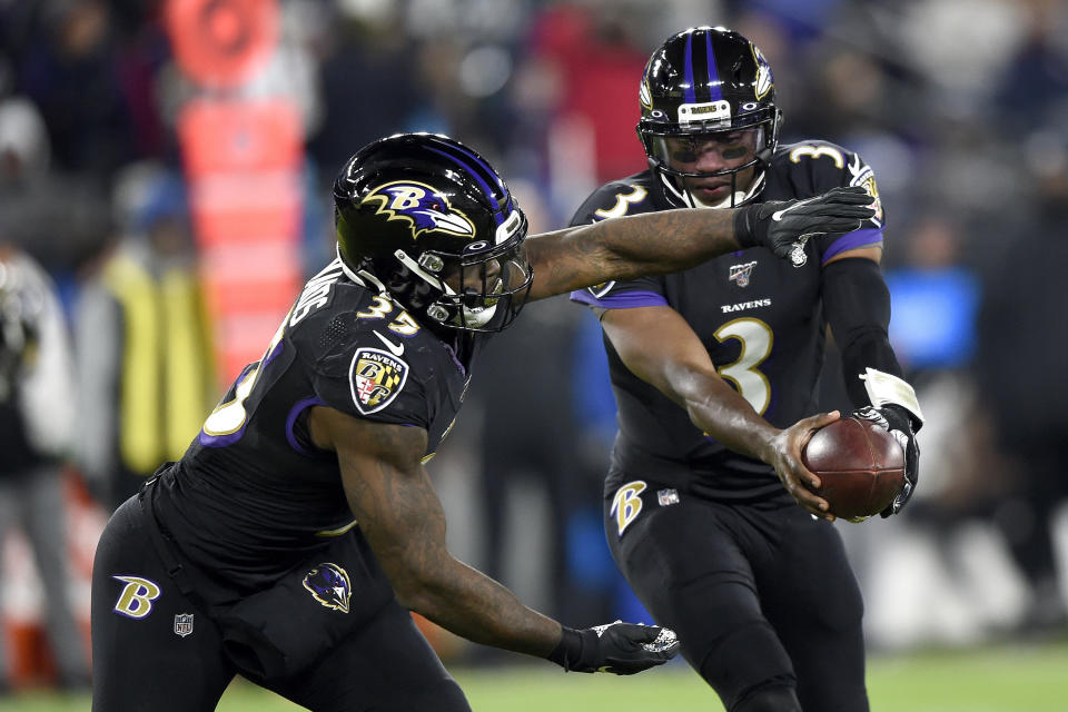 FILE - In this Dec. 12, 2019, file photo Baltimore Ravens quarterback Robert Griffin III (3) prepares to handoff to running back Gus Edwards (35) during the second half of an NFL football game against the New York Jets in Baltimore. It will be Griffin's first NFL start since 2016 on Sunday, Dec. 29. (AP Photo/Gail Burton, File)