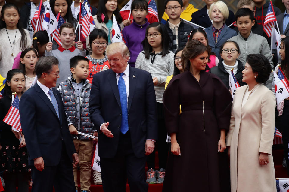 <p>(L to R) South Korean President Moon Jae-In President Donald Trump, First Lady Melania Trump and South Korean first lady Kim Jung-Sook attend the welcoming ceremony at the presidential Blue House on Nov. 7, 2017 in Seoul, South Korea. (Photo: Chung Sung-Jun/Getty Images) </p>