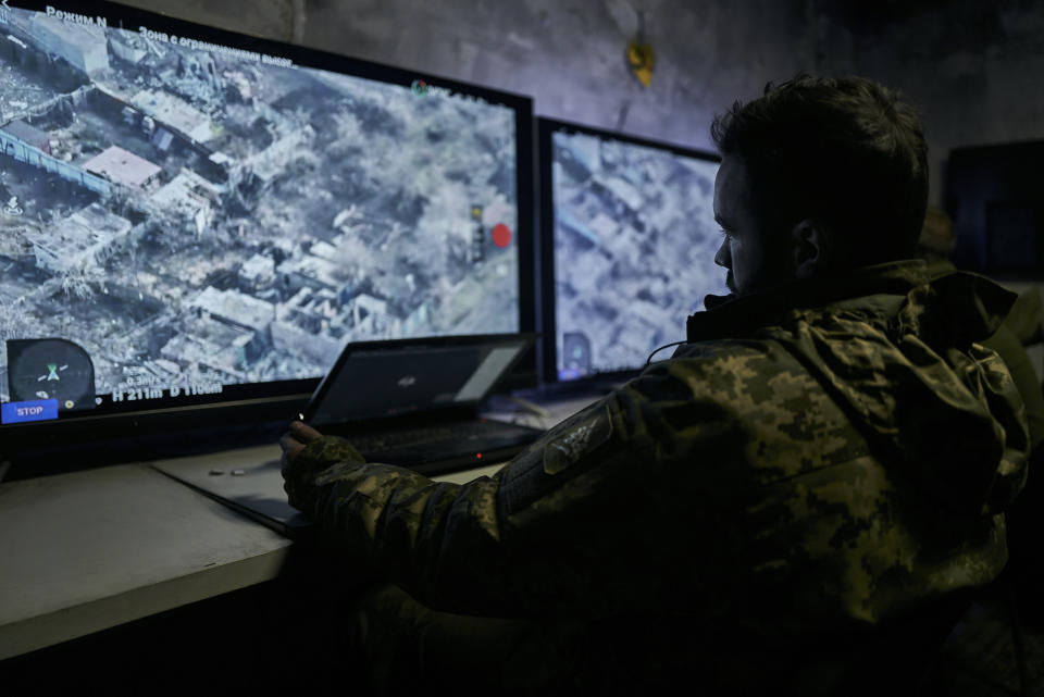 FILE - A Ukrainian soldier watches a drone feed from an underground command center in Bakhmut, Donetsk region, Ukraine, Sunday, Dec. 25, 2022. Drones that Russia said were launched by Ukraine also hit airbases and other facilities in Crimea in August. Russian authorities also have reported repeated Ukrainian drone attacks on Sevastopol that serves as the main base for Russia's Black Sea Fleet, although none of them seemed to inflict any serious damage. (AP Photo/Libkos, File)