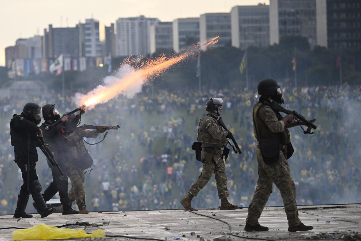 Security forces fire from the National Congress.